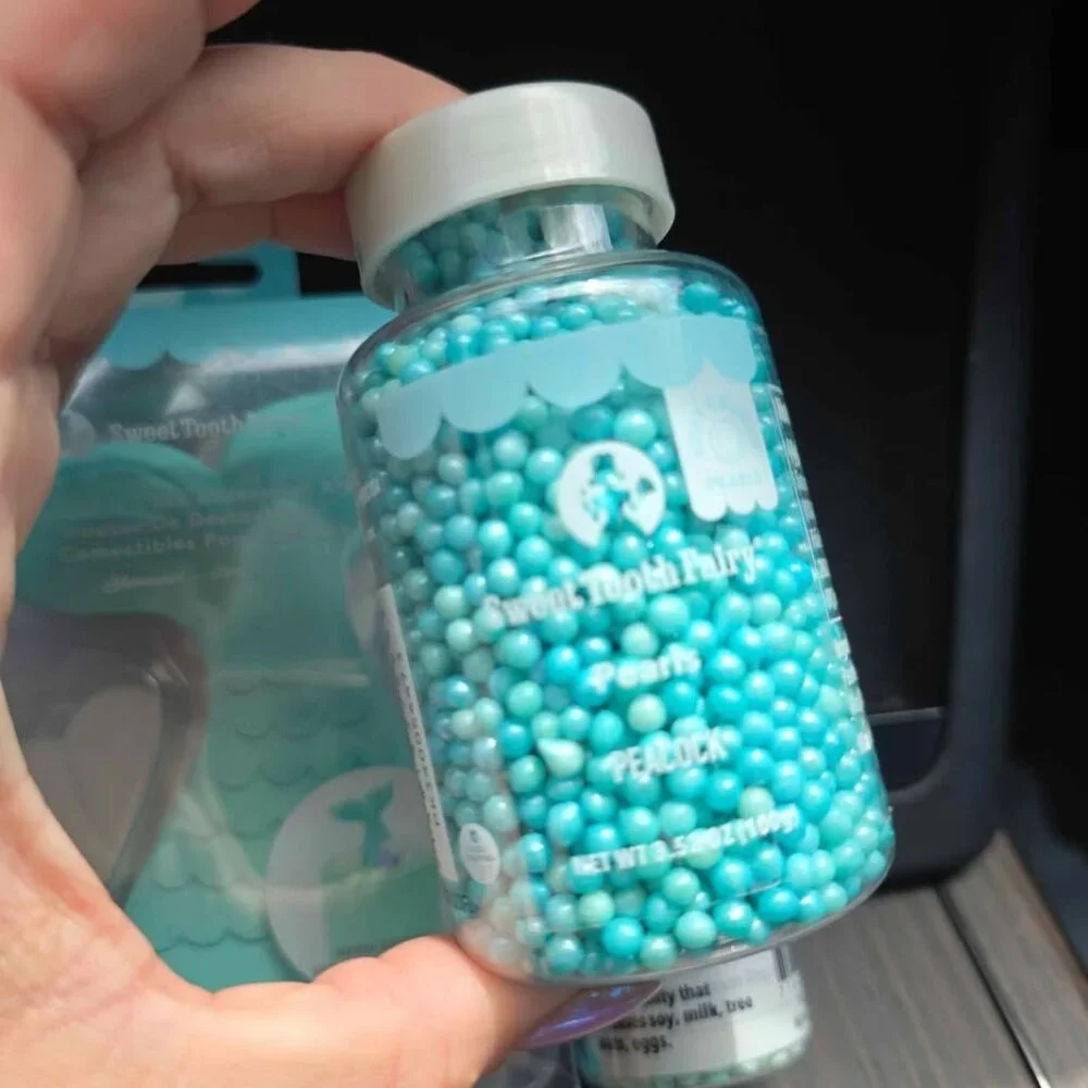 Mermaid tail cake toppers woth 2 jars of sprinkles. New in box Mermaid birthday
